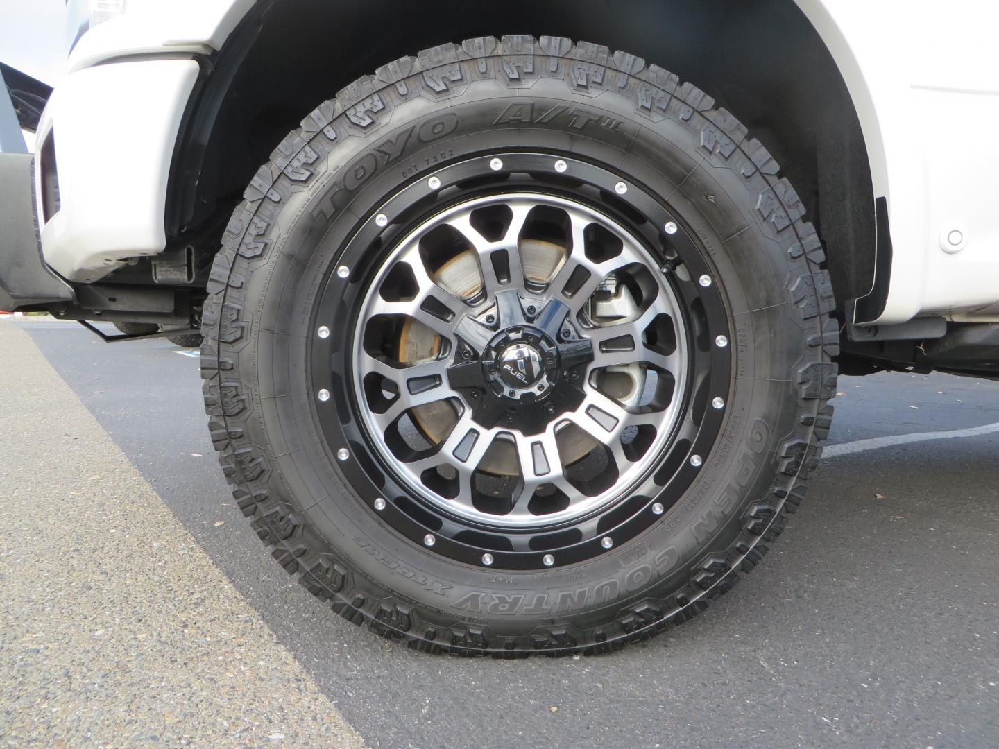 2019 White /BLACK INT W/DARK MARSALA LT Ford F-150 Platinum SuperCrew Cab 4WD (1FTEW1E45KF) with an 3.5L V6 ECOBOOST engine, 10-SPEED AUTO W/TOW MO transmission, located at 2630 Grass Valley Highway, Auburn, CA, 95603, (530) 508-5100, 38.937893, -121.095482 - F150 Platinum featuring a level kit, Fuel Offroad wheels, Toyo AT2 tires, Barricade Front winch bumper, Smittybilt winch, LED light bar, Undercover Ultraflex bedcover, and a Cargo Glide bed system. - Photo#8